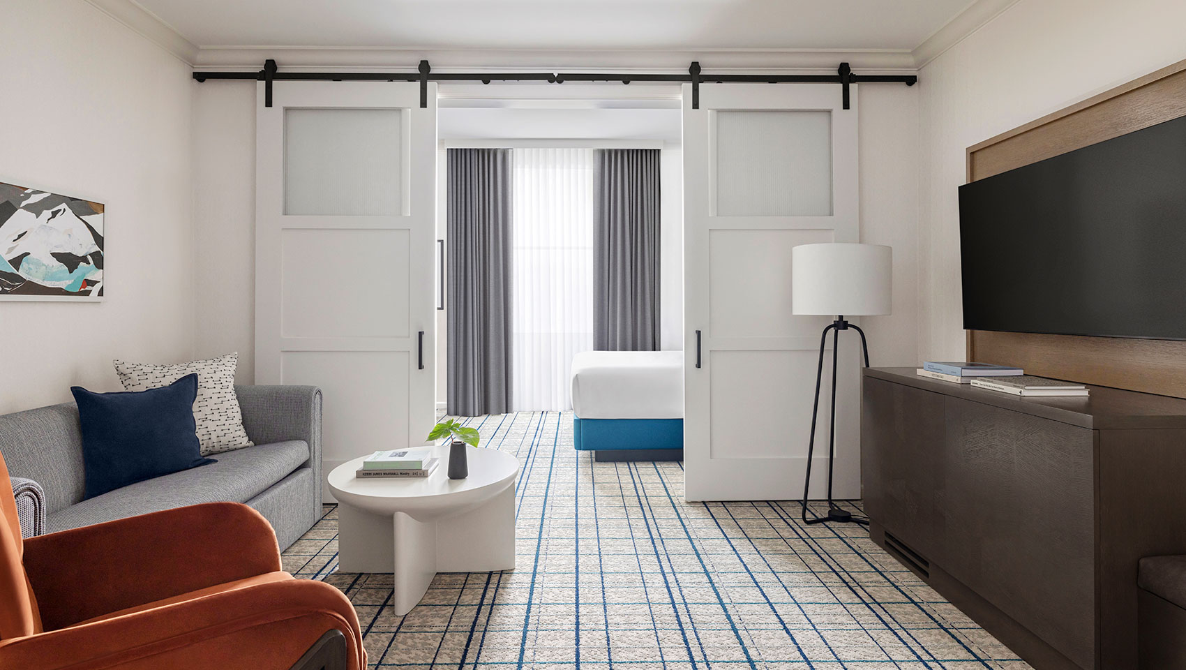 sitting area of suite looking into bedroom at Kimpton Hotel Monaco Salt Lake City