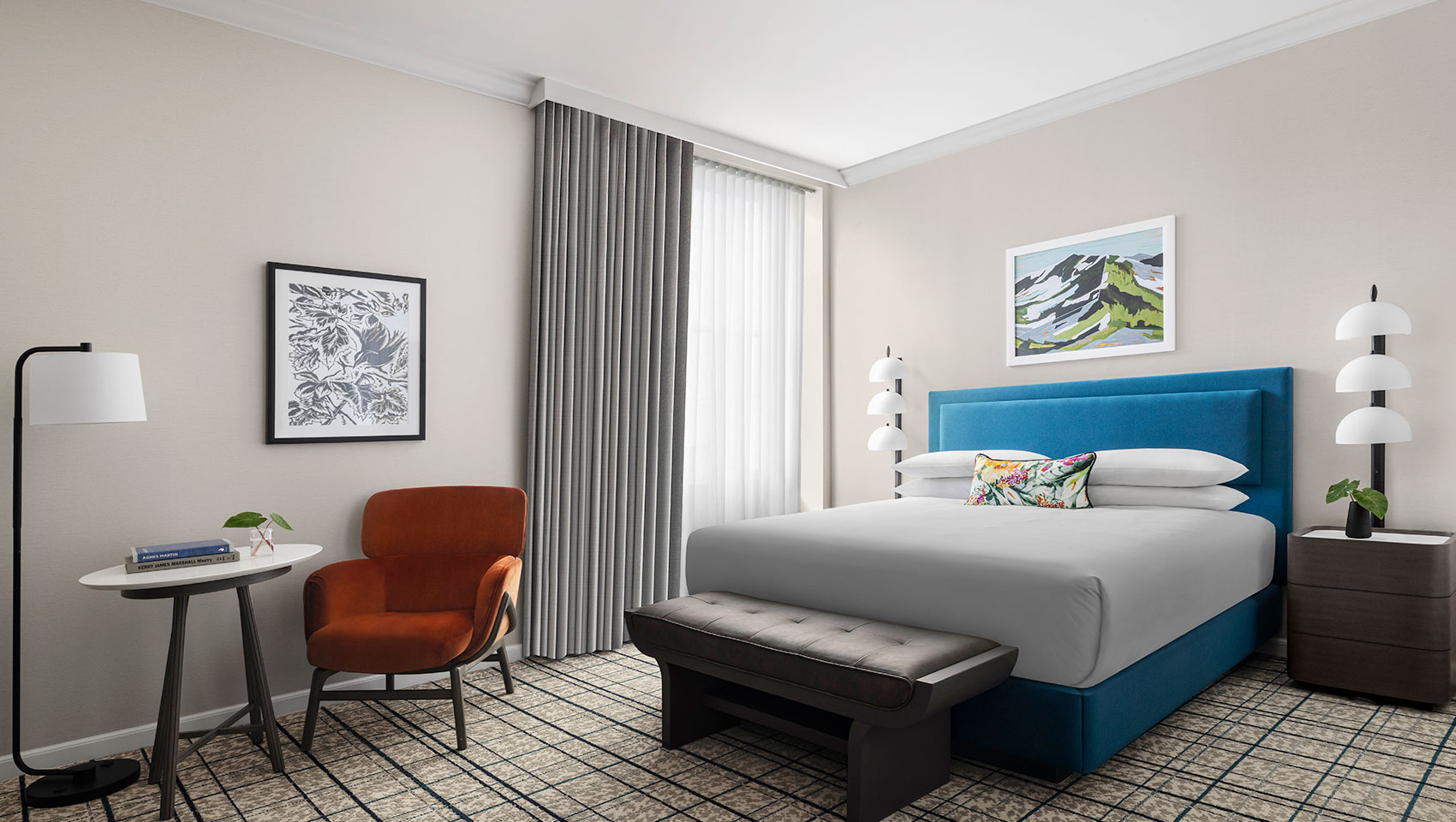 King guest room with side tables, chair and desk at Kimpton Monaco Salt Lake City